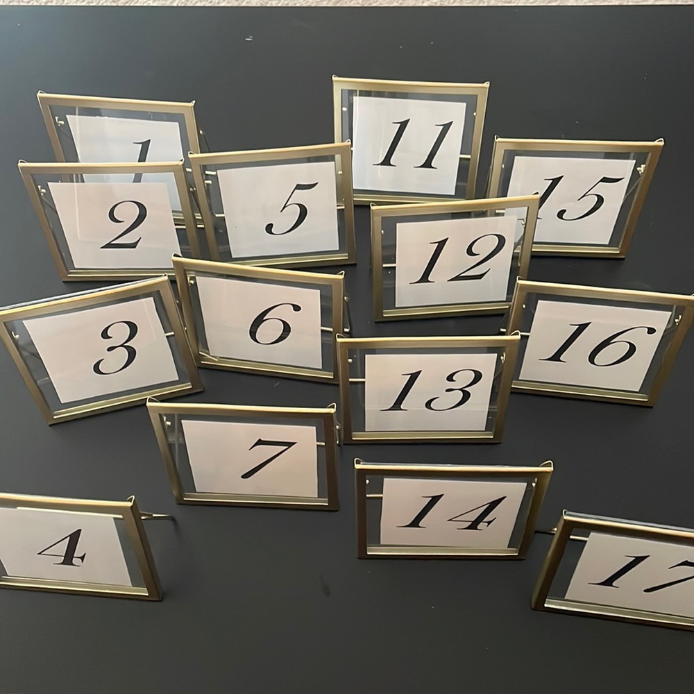 14 4x4” gold picture frames/table numbers